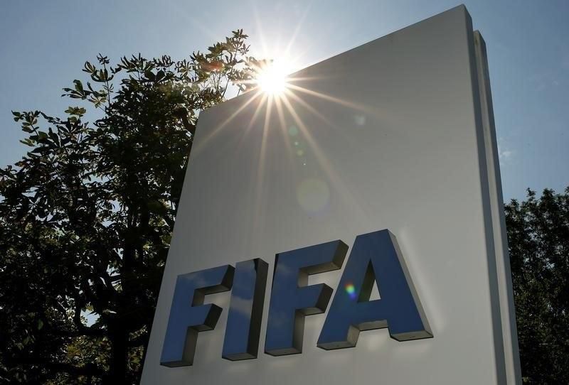 The logo of FIFA is seen in front of its headquarters in Zurich, Switzerland July 20, 2015. REUTERS/Arnd Wiegmann