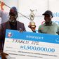 eTranzact MD/CEO, Niyi Toluwalope, presents a trophy and cash prize to the eTranzact Golf Classic champion, Francis Epe.