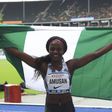 Tobi Amusan celebrates after winning at the ISTAF in Berlin