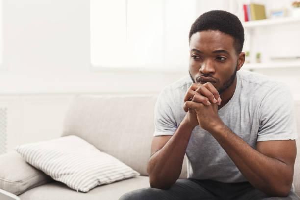 Black man thinking [iStock]