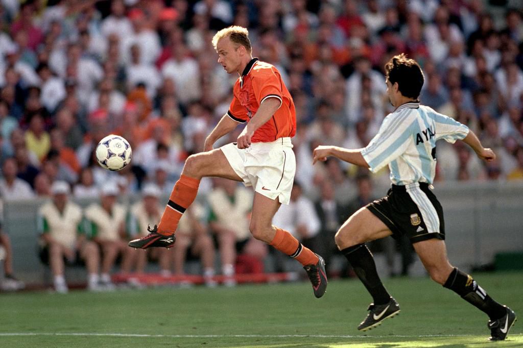 Dennis Bergkamp scoring a last minute goal to knock Argentina out of the World Cup in 1998