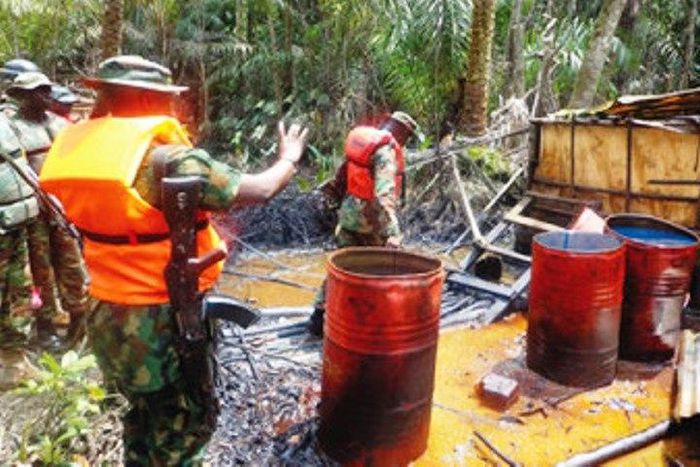 Nigerian military at an illegal refinery