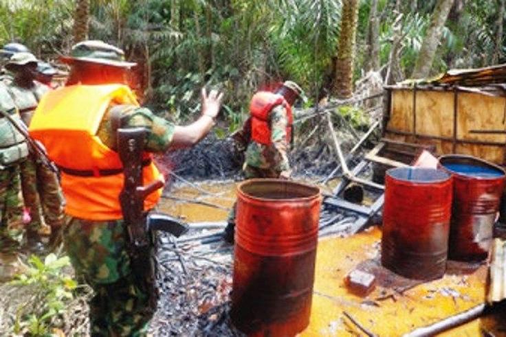 Nigerian military at an illegal refinery