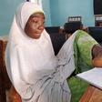 Maryam Umar writing with her leg.
