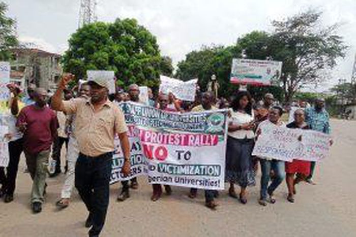 Members of the Academic Staff Union of Universities (ASUU), Federal University of Technology Owerri (FUTO) chapter in a protest march, in Owerri, on Thursday.