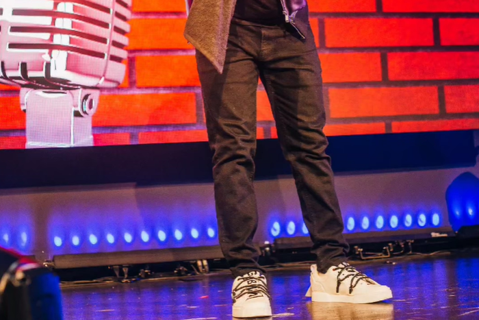 Ayodeji "AY" Makun during the performance of AY: Spotting the Difference [Instagram/@aycomedian]