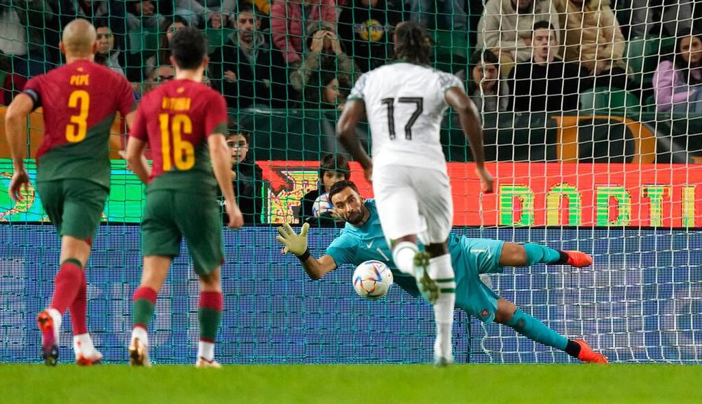 Rui Patricio saves Emmanuel Dennis's penalty in Portugal's win