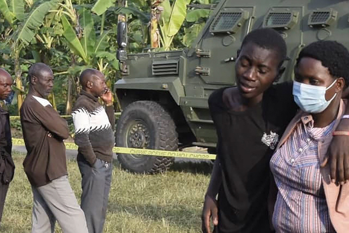 Militants kill 42 in attack on school in western Uganda.