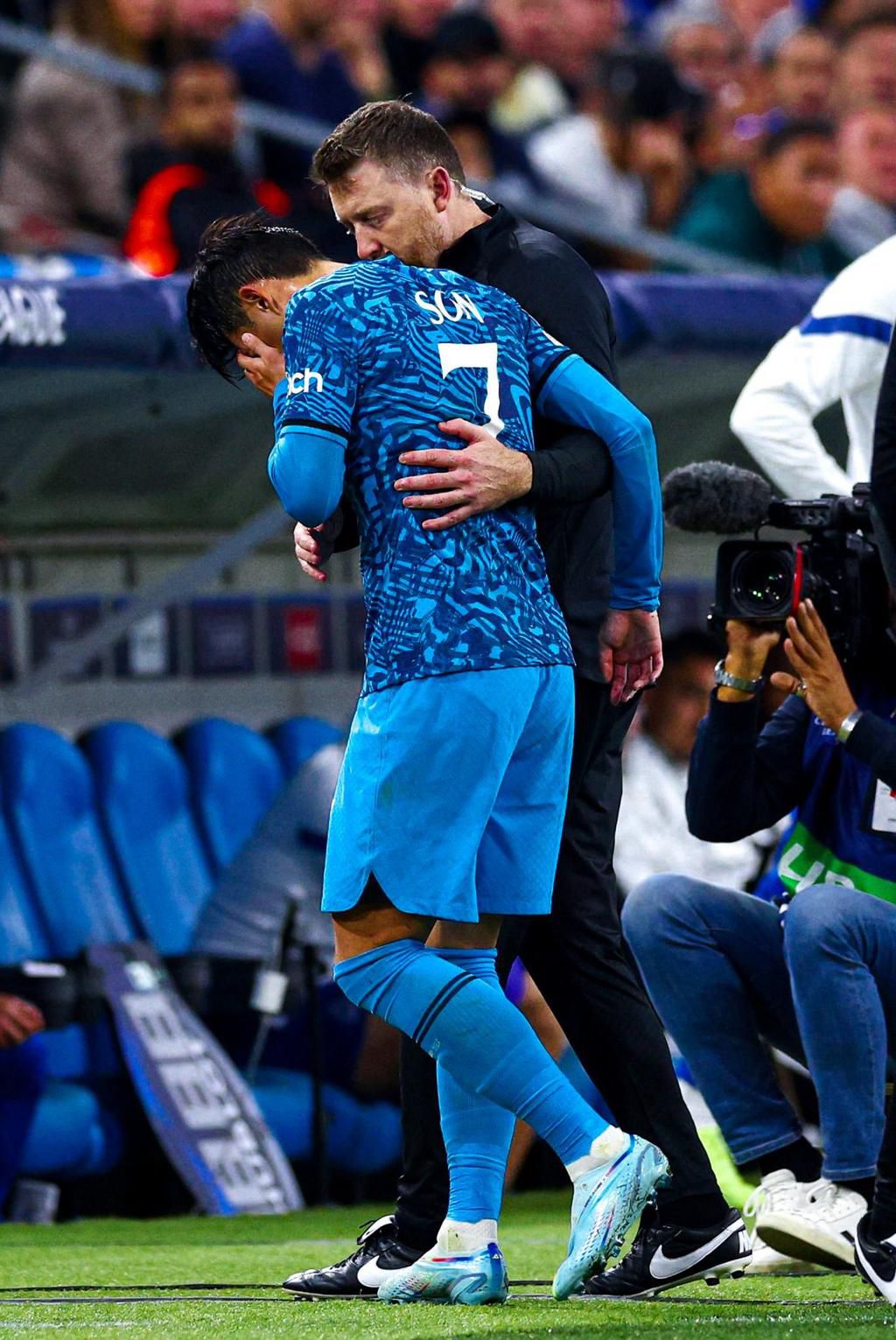 Son walks off after the collision.