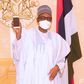 President Muhammadu Buhari receives first made in Nigeria cell phone. [The Nation]