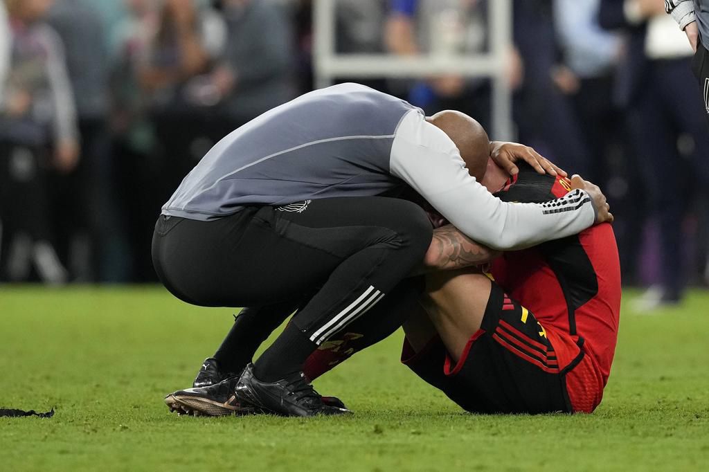 Thierry Henry consoles Toby after the game.