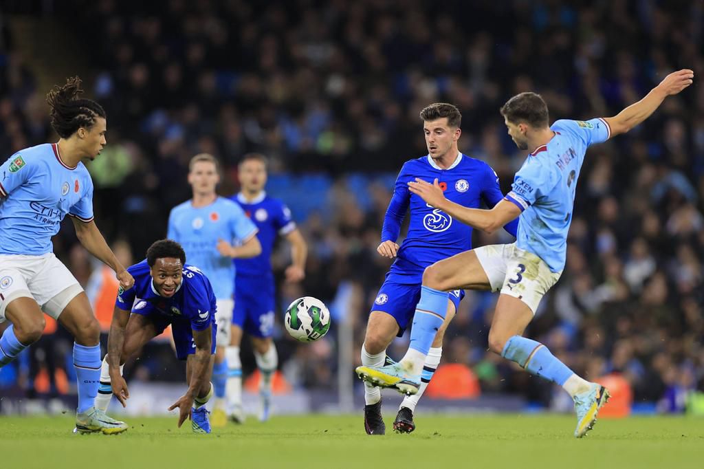 November 9, 2022, Manchester, Manchester, United Kingdom: Ruben Dias 3 of Manchester City wins the ball against Mason Mount 19 of Chelsea during the Carabao Cup Third Round match