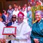 INEC chairman, Prof Mahmood Yakubu, presents certificate of return to president-elect, Bola Tinubu [Twitter/@BashirAhmaad]