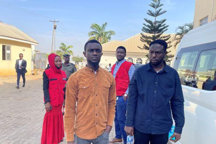 Abuja men defraud American