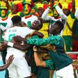 Senegal celebrating after becoming one of only two African nations to advance to the round of 16 of the World Cup in Qatar