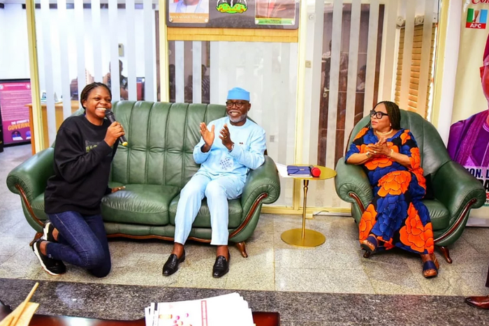 Folakemi Omoyeni kneeling to greet the Ondo State acting governor, Lucky Aiyedatiwa [NAN]