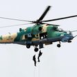 The Nigerian Air Force officers descend from one of the Nigerian fighter jets. [Punch]