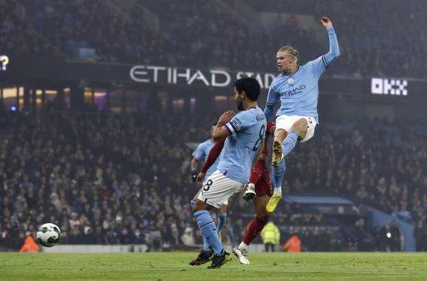 Erling Haaland scoring the first goal for Manchester City against Liverpool in the Carabao Cup