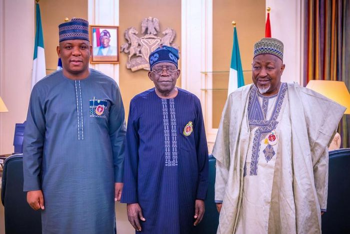 President Bola Tinubu (M), Minister of Steel Development, Shuaibu Abubakar Audu (L) and Defence Minister, Badaru Abubakar (R) [Presidency]