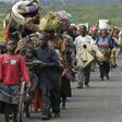 Refugees fleeing the DRC during fighting between rebels and government troops