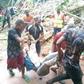 Pic. shows sympathisers moving one of the casualties out of the collapsed building at Egbu Umuenem, Nnewi North LGA on Sunday. [NAN]