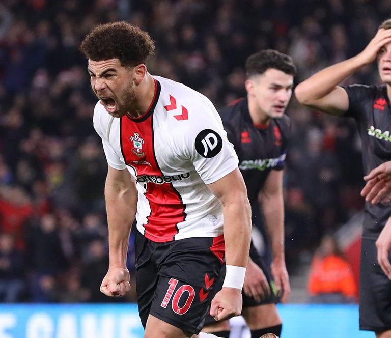 Che Adams celebrates one of the goals.