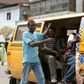 Lagos bus conductor.