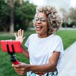 A vlogger recording content for her social networks with a mobile phone at the parkXavier Lorenzo/Getty Images