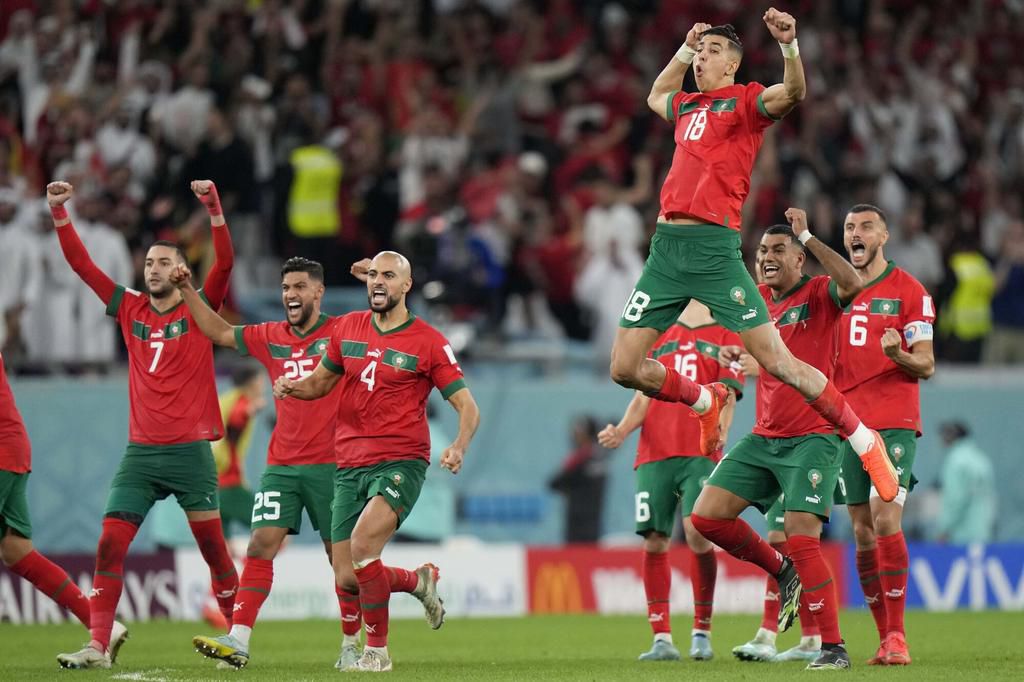 Morocco to celebrating their win against Spain