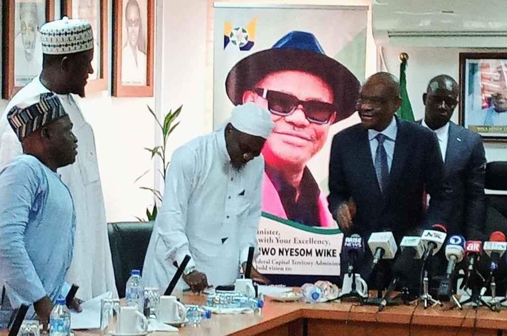 FCT Minister, Mr Nyesom Wike (right) with officials of Committee of FCT Imams Initiative (CFII) [NAN]