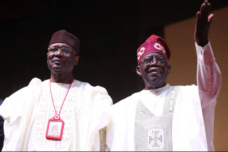 L-R: Former INEC chairman, Prof. Mahmood Yakubu and President Bola Tinubu [Kola Sulaimon/AFP]