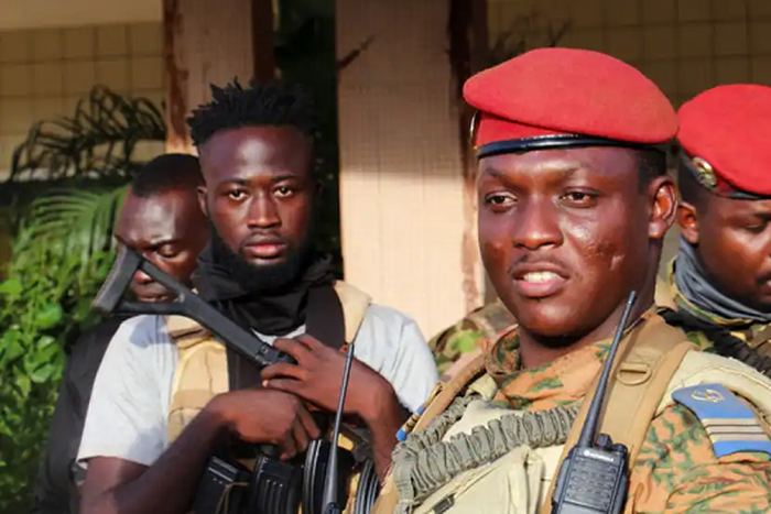 Burkina Faso’s military leader, Ibrahima Traore, is escorted by soldiers in Ouagadougou, Burkina Faso. (FILE)
