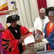 Former EFCC Boss, Ibrahim Magu, receiving award of Doctoral Fellowship of the Institute for Governance and Leadership Studies in Africa (IGLSA) in Abuja on Saturday (18/11/23) [NAN]