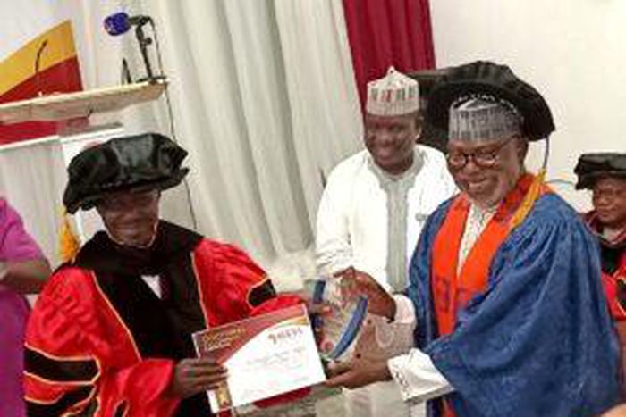 Former EFCC Boss, Ibrahim Magu, receiving award of Doctoral Fellowship of the Institute for Governance and Leadership Studies in Africa (IGLSA) in Abuja on Saturday (18/11/23) [NAN]