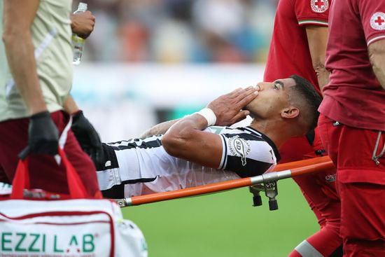 Adam Masina stretched off injured