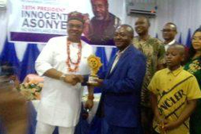 Prof. Monday Igwe (on suit) receiving the award (Credit: NAN)