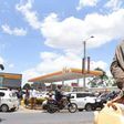 A man with jerrycans waits to buy fuel in Eldoret town on April 3, 2022 amid a biting shortage. Kenya is staring at a fuel crisis due to delays in subsidy payouts by the government. Jared Naytaya | Nation Media Group