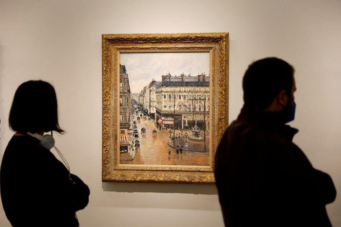 Camille Pissarro's "Rue Saint-Honore in the Afternoon. Effect of Rain, 1897" at Thyssen-Bornemisza museum in Madrid, April 22, 2022.Susana Vera/Reuters