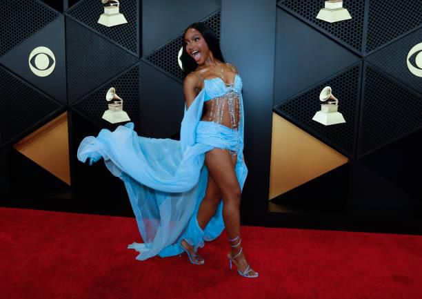 Ayra excitedly takes a picture at the Grammys[gettyimages]