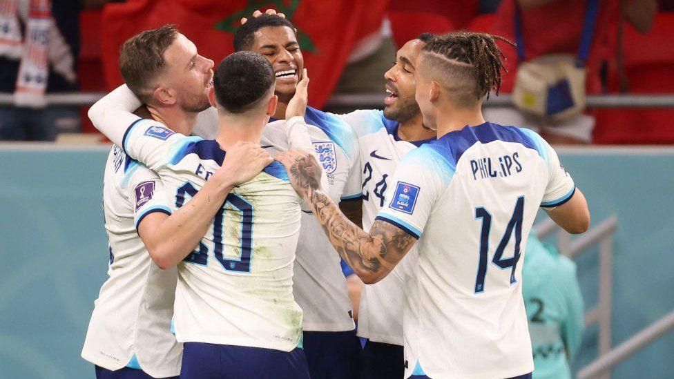 England players celebrating after their victory over Wales