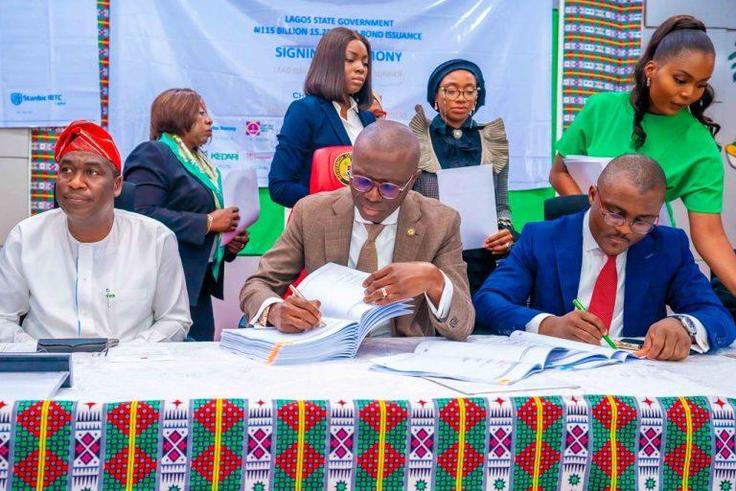 Lagos State governor, Babajide Sanwo-Olu (middle), with deputy governor, Dr Obafemi Hamzat (left), and Commissioner for Finance, Dr Rabiu Olowo (right) [NAN]