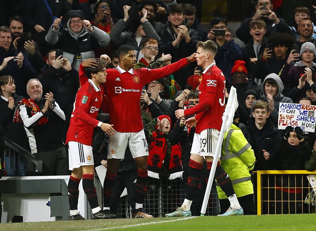Manchester United players celebrating a goal