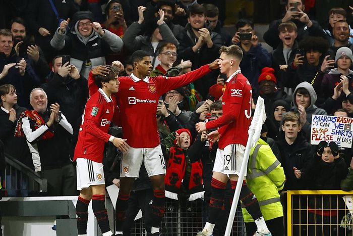 Manchester United players celebrating a goal