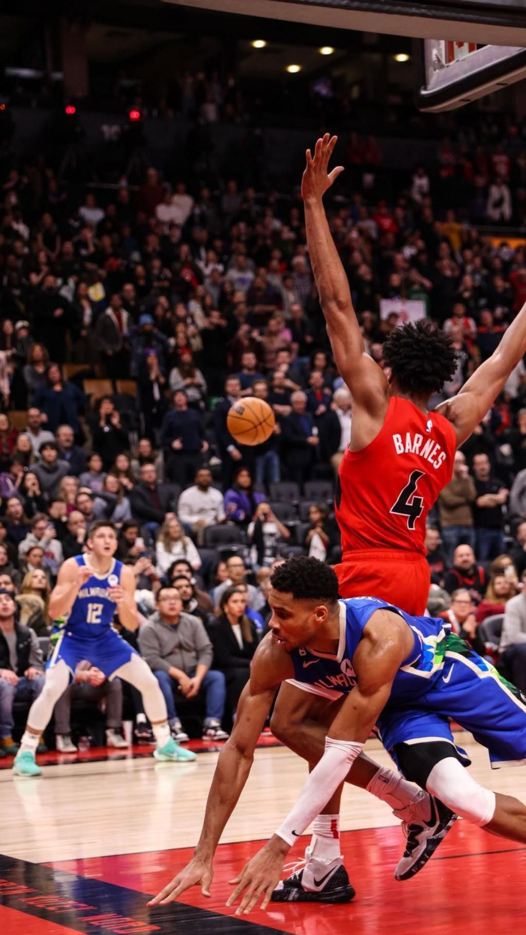 Giannis Antetokounmpo records triple-double as Bucks outlast Raptors