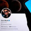 The Twitter logo seen displayed on a smartphone with Elon Musk's account in the background.