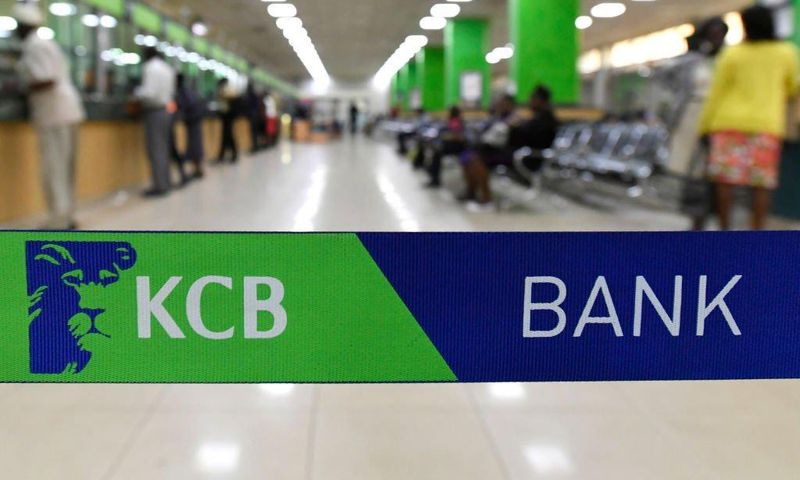 Customers are served at the Kenya Commercial Bank (KCB) in Nairobi on January 24, 2018. (Photo by SIMON MAINA/AFP via Getty Images)