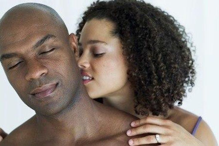 Black couple kissing