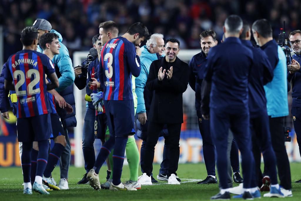 Xavi and his Barcelona players.