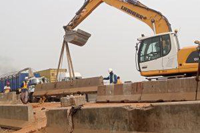 Removal of crash barriers to re-open Section One of the Lagos-Ibadan Expressway, Kara portion on the Lagos bound carriageway to traffic on Friday in Lagos.