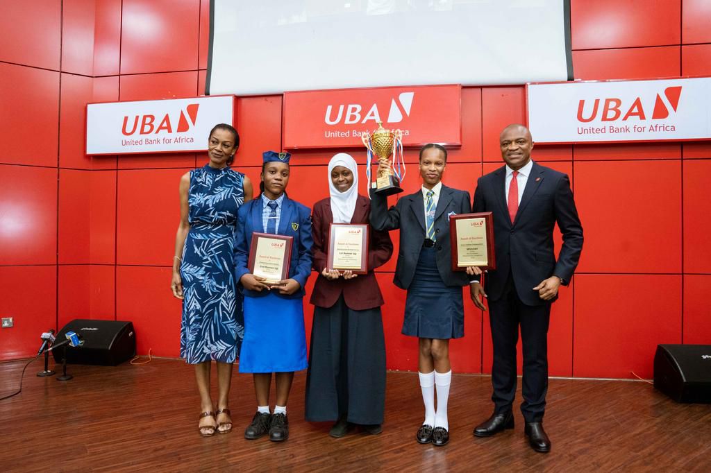 L-R: Managing Director/CEO , United Bank for Africa(UBA) Foundation, Mrs Bola Atta; 3rd Prize winner, 2023 UBA National Essay Competition and Student of Queens College Yaba, Chukwuka-Okoh Naomi Chizaram; 2nd Prize winner and student of Sweet Haven High...
